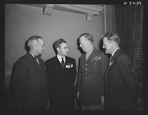 Citation winners. General George C. Marshall, Chief of Staff, U.S. Army, is shown interviewing Edwin Curtiss Tracy (left), citation winner and Stanley Crawford certificate winner, both employed by the RCA Manufacturing Company, Camden, New Jersey following a luncheon tendered by Donald M. Nelson, Ch