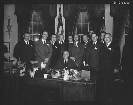 Citation winners. President Roosevelt is shown here with the group, left to right: Herbert R. James, Christy Park Works, National Tube Company, McKeesport, Pennsylvania; George Smolarek, Packard Motor Car Company, Detroit, Michigan; Walter P. Hill, C&H Consolidated Copper Company, Detroit, Michigan;