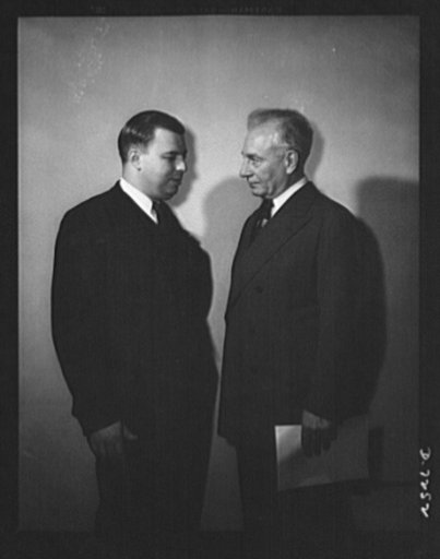 Citation winner, Walter P. Hill, of the Wolverine Tube Division of the Calumet and Hecla Consolidated Copper Company, of Detroit, Michigan and William G. Marshall (right) Chairman of the War Production Drive, who presented the workers to President Roosevelt