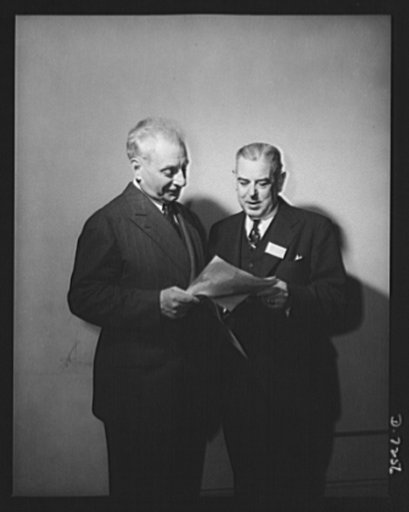 Citation winners. Citation winner, Madison E. Butler, of the Stromberg-Carlson Telephone Manufacturing Company, Rochester, New York and William G. Marshall (left), Director of the War Production Drive, who presented the workers to President Roosevelt