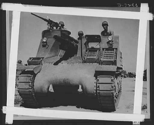 The M-7 is the Army's newest tank destroyer and is being given the acid test for desert warfare in the maneuvers near Iron Mountains, California.  Colonel R. Downing of DeKalb, Missouri, Corporal L. Roberts from Graham, Texas, and Lieutenant M. Hutchison, Enterprise, Alabama. For firing power, the M