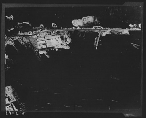 U.S. Air Force bombs Tripoli. Clouds of smoke tell the story of the successful raid by U.S. Army Air Force bombers on the Spanish mole at Tripoli. Their objective was only the mole and not ships in the harbor. This third picture in a series was taken as the bomber group finished its mission
