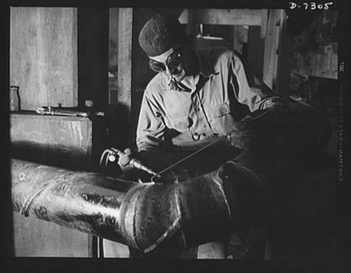 Tennessee Valley Authority. Construction of Douglas Dam. Gas welding a joint in a line of spiral pipe at the TVA's new Douglas Dam on the French Broad River. This dam will be 161 feet high and 1,682 feet long, with a 31,600 acre reservoir area extending forty-three miles upstream. With a useful stor