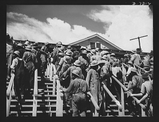 Tennessee Valley Authority. Construction of Douglas Dam. Pay day at the TVA's new Douglas Dam on the French Broad River. This dam will be 161 feet high and 1,682 feet long, with a 31,600 acre reservoir area extending forty-three miles upstream. With a useful storage capacity of approximately 1,330,0