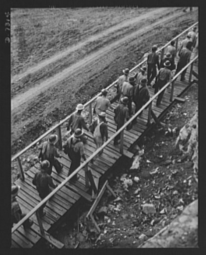 Tennessee Valley Authority. Construction of Douglas Dam. A new shift reports for duty at the TVA's new Douglas Dam on the French Broad River. This dam will be 161 feet high and 1,682 feet long, with a 31,600 acre reservoir area extending forty-three miles upstream. With a useful storage capacity of 