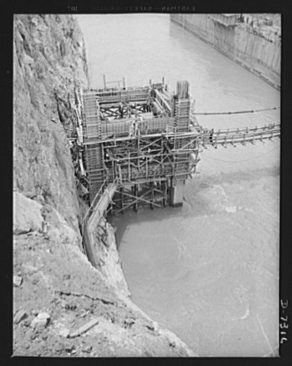 Tennessee Valley Authority. Construction of Douglas Dam. Caisson construction on TVA's new Douglas Dam on the French Broad River. This dam will be 161 feet high and 1,682 feet long, with a 31,600 acre reservoir area extending forty-three miles upstream. With a useful storage capacity of approximatel