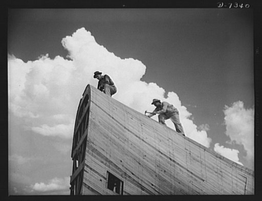 Tennessee Valley Authority. Construction of Douglas Dam.  Making forms for the generating plant to be built at TVA's new Douglas Dam on the French Broad River. This dam will be 161 feet high and 1,682 feet long, with a 31,600 acre reservoir area extending forty-three miles upstream. With a useful st