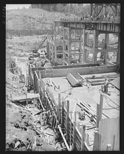 Tennessee Valley Authority. Construction of Douglas Dam.  First concrete is poured along the line of TVA's new Douglas Dam on the French Broad River. This dam will be 161 feet high and 1,682 feet long, with a 31,600 acre reservoir, 1,330,00 acre feet, this reservoir will make possible the addition o