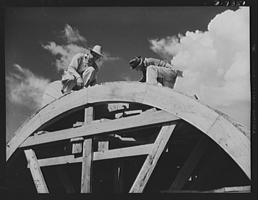 Tennessee Valley Authority. Construction of Douglas Dam. Making forms of the generating plant at TVA's new Douglas Dam on the French Broad River. This dam will be 161 feet high and 1,682 feet long, with a 31,600 acre reservoir area extending forty-three miles upstream. With a useful storage capacity