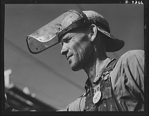 Tennessee Valley Authority. Construction of Douglas Dam. Hot tar tank tender at the site of TVA's new Douglas Dam on the French Broad River. His job is to supply hot tar used to fill cavaties in the bed rock. This dam will be 161 feet high and 1,682 feet long, with a 31,600 acre reservoir area exten