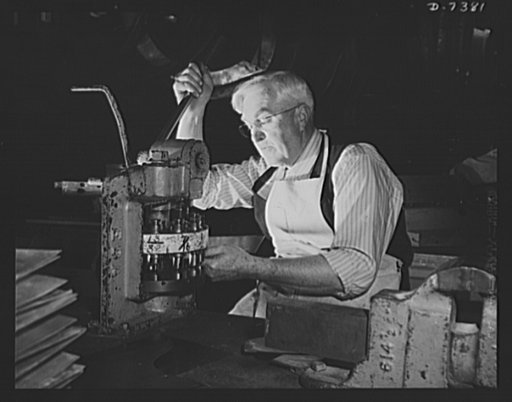 Production. Airplane manufacture, general. Older men are playing a more and more important part in war production. An elderly employee of North American Aviation, Incorporated, turns out a heavy quota of sheet metal parts for war planes on a hand press at the Inglewood, California plant.  This plant