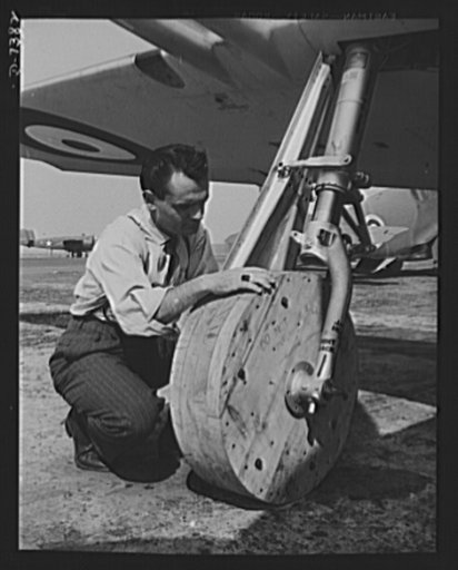 Production. P-51 "Mustang" fighter planes. Wooden wheels are attached to a P-51 "Mustang" fighter plane, so it may be moved around the ramp at the Inglewood, California plant of North American Aviation, Incorportated. When it is ready for flight tests, regular landing wheels with rubber tires will b