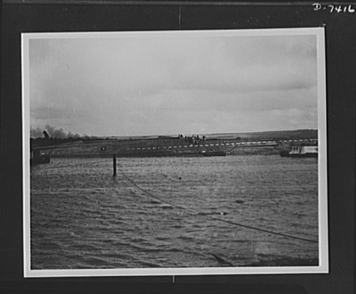 Pearl Harbor bombing. USS Utah. Rescue parties are working on openings in the hull of the USS Utah, a target ship sent to the bottom of Pearl Harbor during the Japanese air attacks