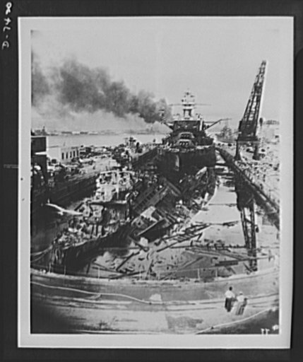 Pearl Harbor bombing. USS Downes and Cassin. The jumbled mass of wreckage in the foreground of drydock number one are the U.S. destroyers, Downes (left) and Cassin (right). The battleship in the rear is the USS Pennsylvania, 33,100 ton flagship of the Pacific Fleet, which suffered relatively light d