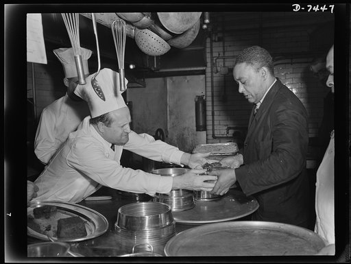 Dehydrated food luncheon at Senate. Chef Denissen hands out plates filled with dehydrated foods to be served in the dining room of the United State Senate. These new foods will contribute largely to feeding the fighting forces and refuges abroad