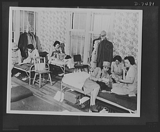 Women's Army Auxiliary Corps. A scene in the WAAC squad room in Daytona Beach, Florida where members gather during leisure periods on Saturday afternoon. The WAACs are using local hotels for their quarters