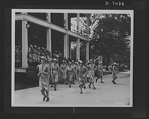 Women's Army Auxiliary Corps. WAACs are shown answering call to assembly. Fort Des Moines, Iowa, 1942