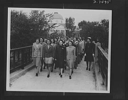 Women Accepted for Voluntary Emergency Service. Hep, two, three, four clipping of a brisk cadence, enlisted WAVES cross their first bridge enroute to their initial drill session on the Smith College Campus, Northampton, Massachusetts. The gals didn't even have time to change from their street clothe