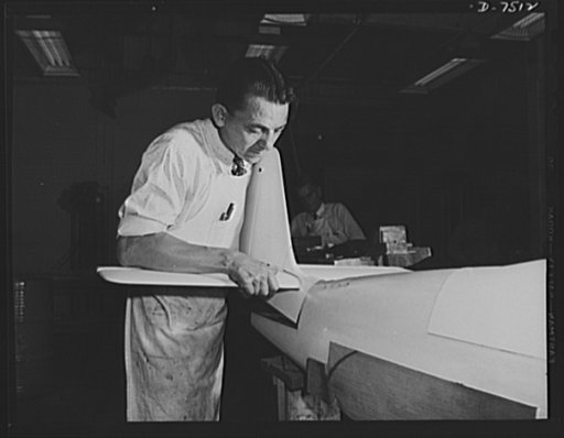 Production. Airplane manufacture, general.  Model makers prepare accurately sealed minatures of planes built at the Inglewood, California, plant of North American Aviation, Incorporated. Here an experimental model of the P-51 ("Mustang") is being finished for wind tunnel and other tests. This plant 