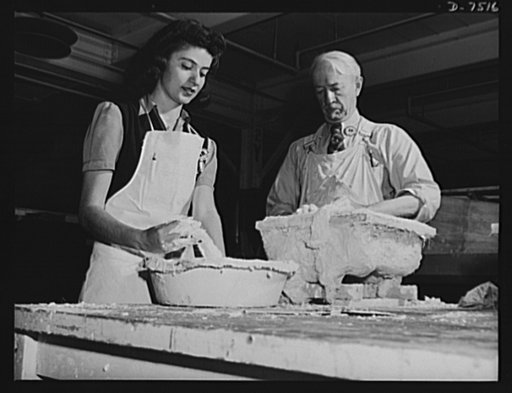 Production. Airplane manufacture, general.  The sculptor's art plays an important part in making dies for the production of modern airplanes. An old master at the Inglewood, California, plant of North American Aviation, Incorporated works with plaster mixed to the proper consistency by a young woman