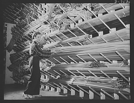 Production. Airplane manufacture, general. Miles of preformed aluminum alloy tubing are placed on racks in stockrooms ready for assembly in bomber and fighter planes built at the Inglewood, California, plant of North American Aviation, Incorporated, where women are fast taking over the jobs of the s