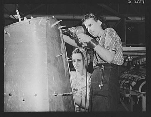 Production. Airplane manufacture, general. Two woman worker at the Inglewood, California, plant of North American Aviation, Incorporated, prepare a B-25 nacelle for riveting. This plant produces the battle-tested B-25 ("Billy Mitchell") bomber, used in General Doolittle's raid on Tokyo, and the P-51