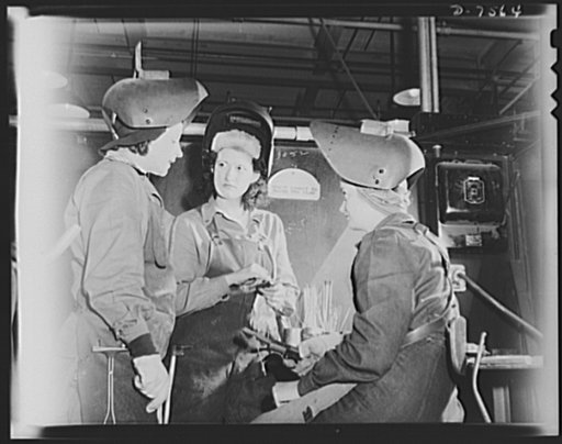 Production. Airplane manufacture, general. Women arc welders discuss the production of motor mounts and welded parts in a welding booth at the  Inglewood, California, plant of North American Aviation, Incorporated. This plant produces the battle-tested B-25 ("Billy Mitchell") bomber, used in General