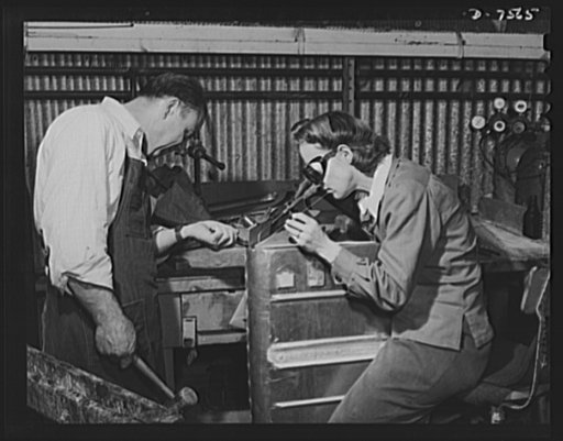 Production. Airplane manufacture, general. A women acetylene welder works side by side with a man worker on an airplane gas tank at the North American's California, plant. This plant produces the battle-tested B-25 ("Billy Mitchell") bomber, used in General Doolittle's raid on Tokyo, and the P-51 ("