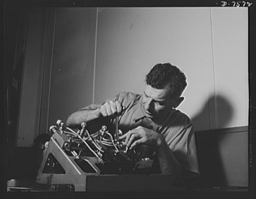 Production. Airplane manufacture, general. Making final adjustments on an "automatic pilot" which will be mounted in a war plane at the North American Aviation Inglewood, California, plant. This plant produces the battle-tested B-25 ("Billy Mitchell") bomber, used in General Doolittle's raid on Toky