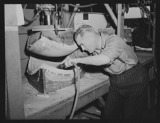Production. Airplane manufacture, general.  Forming lucite (a shatter-proof plastic "glass") for war plane enclosures requires extreme care. Here an employee at North American Aviation's Inglewood, California plant cleans a mold with compressed air before forming the part. This plant produces the ba