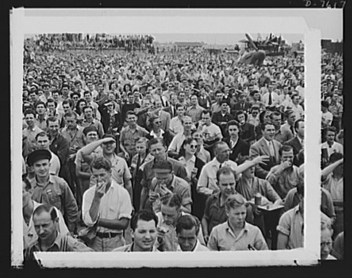Production. Airplane manufacture, general. Thousands of North American Aviation employees at Inglewood, California look skyward as the bomber and fighter planes they helped build perform overhead during a lunch period air show. This plant produces the battle-tested ("Billy Mitchell") bomber, used in