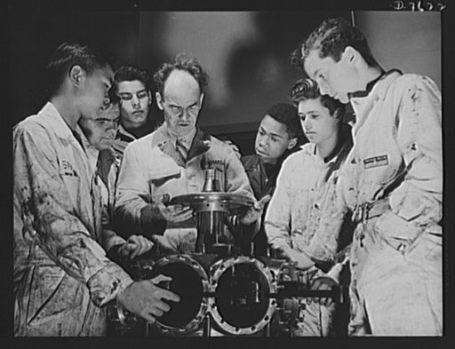 Victory Corps, tomorrow's defenders of liberty. Knowledge of the mechanism of an airplane engine is important to the flyer or the mechanic. In Los Angeles, California, Polytechnic High School Victory Corps boys who will be the men to "keep'em flyin" in the future are being given technical training