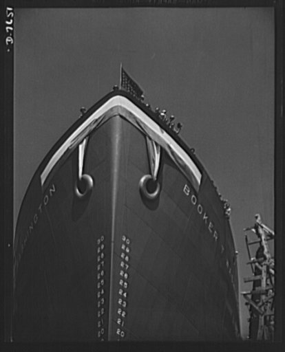 Production. Launching of the SS Booker T. Washington. Shipyard workers of many racial groups which helped construct the SS Booker T. Washington, first Liberty Ship named for a Negro, wave from the deck of the vessel a short time before it was launched at the California Shipbuilding Corporation's yar