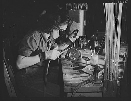 Production. B-25 "Billy Mitchell" bombers. A woman welder at the Inglewood, California, plant of North American Aviation works on a sub-assembly for one of the huge tanks that go into B-25 bombers. In addition to the battle-tested B-25 "Billy Mitchell" bomber, used in General Doolittle's raid on Tok