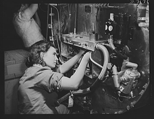 Production. B-25 "Billy Mitchell" bombers. Switch boxes on the firewalls of B-25 bombers are assembled by women workers at North American's Inglewood, California, plant. In addition to the battle-tested B-25 "Billy Mitchell" bomber, used in General Doolittle's raid on Tokyo, this plant produces the 