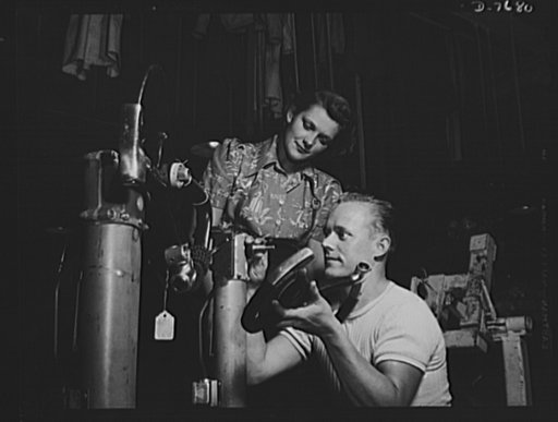 Production. B-25 "Billy Mitchell" bombers. Controls for B-25 bomber are assembled by men and women in the machine parts sub-assembly department of North American's Inglewood, California, plant. In addition to the battle-tested B-25 "Billy Mitchell" bomber, used in General Doolittle's raid on Tokyo, 