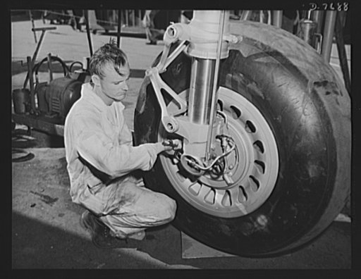 Production. B-25 "Billy Mitchell" bombers. Adjustments are made on the main landing gear of a B-25 bomber at the Inglewood, California, plant of North American Aviation. In addition to the battle-tested B-25 "Billy Mitchell" bomber, used in General Doolittle's raid on Tokyo, this plant produces the 