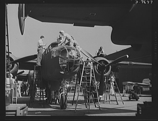 Production. B-25 "Billy Mitchell" bombers. Employees on the "Sunshine" assembly line at North American's Inglewood, California, plant, put the finishing touches on another B-25 bomber. In addition to the battle-tested B-25 "Billy Mitchell" bomber, used in General Doolittle's raid on Tokyo, this plan