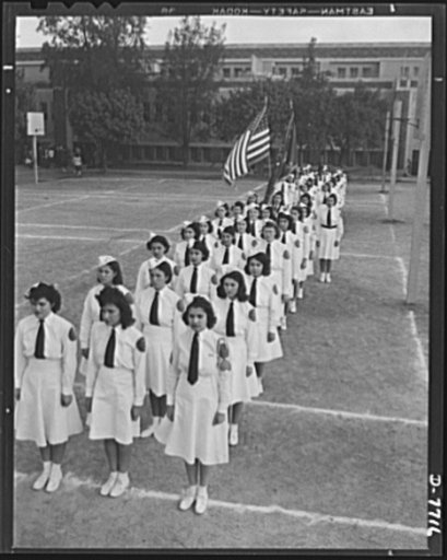 High school Victory Corps. In order to provide training in teamwork, mental and physical coordination and to give opportunites for development of leadership qualities, one of the objectives of the High School Victory Corps is voluntary military drill. These students at Roosevelt High School in Los A