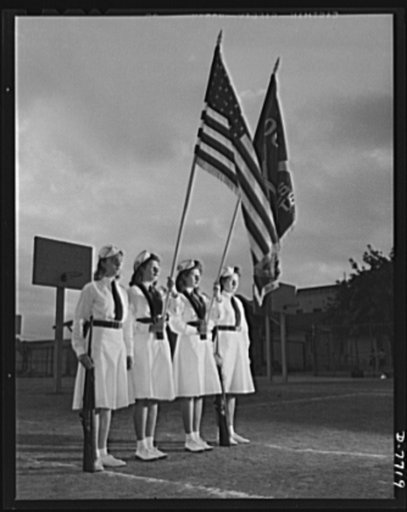 High school Victory Corps. Standing at ease are the members of the girls' team of Roosevelt High School, Los Angeles, California. Rifle practice is one of the school's Victory Corps