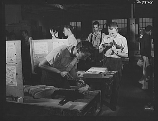 High school Victory Corps. In peacetime at this woodworking shop at Washington High School, Los Angeles, California, students learned cabinet-making, or made wood patterns to be used in making metal objects. Since Pearl Harbor, as in high schools all over the country, they are constructing scale mod