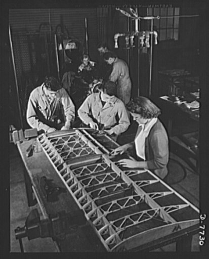 High school Victory Corps. In aeronautics class at Washington High School, Los Angeles, California, future airplane mechanics are trained by working with actual plane parts