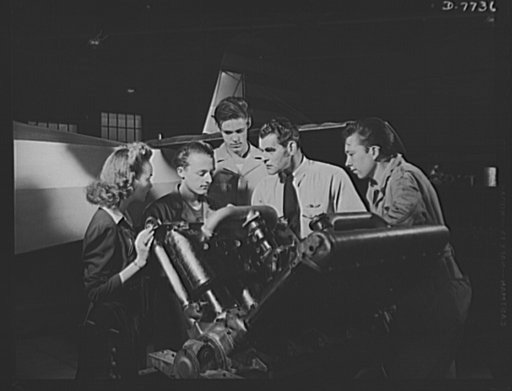 High school Victory Corps. It's a serious business. Future airplane mechanics, these students at Washington High School, Los Angeles, California