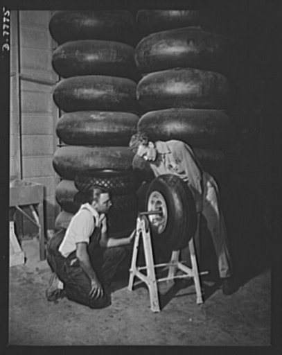 Production. P-51 ("Mustang) fighter planes. Two employees at North American's Inglewood, California, plant, test the balance of a mounted tire for a P-51 fighter. In the background are tires for B-25 bombers. This plant produces the battle-tested B-25 ("Billy Mitchell") bomber, used in General Dooli