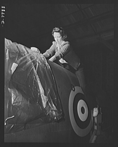 Production. P-51 "Mustang" fighter planes. A North American Aviation woman employee at Inglewood, California, sits astride a "Mustang" fighter for Royal Air Force (RAF), as she places a bag of chemicals in the plane to prevent the accumulation of moisture. This plant produces the battle-tested B-25 