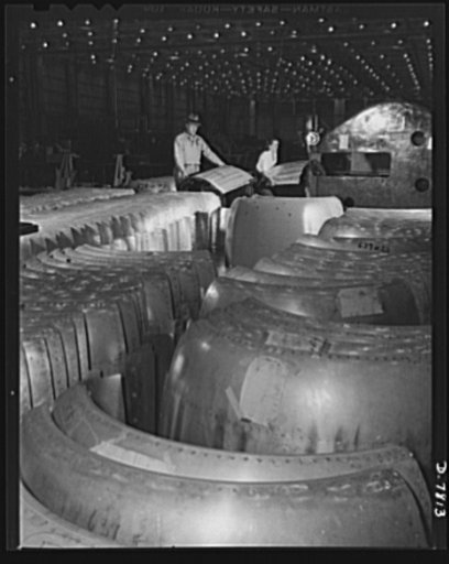 Production. B-17F heavy bombers. Aluminum cowl sections for B-17F heavy bombers are checked and inspected in the Long Beach, California, plant of Douglas Aircraft Company. Better known as the "Flying Fortress," the B-17F is a later model of the B-17, which distinguished itself in action in the South