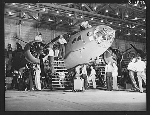 Production. B-17F heavy bombers. Busy workers at the Long Beach, California, plant of Douglas Aircraft Company, groom a new B-17F heavy bomber as the "Flying Fortress." The B-17F is a later model of the B-17, which distinguished itself in action in the South Pacific, over Germany and elsewhere. It i
