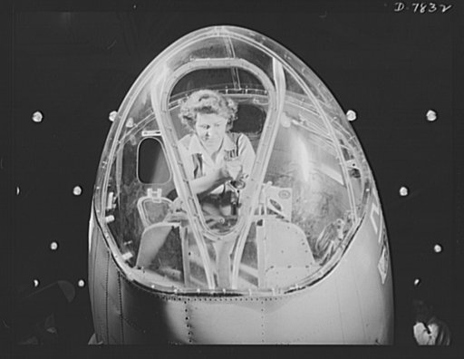 Production. B-17F heavy bombers. A woman plane construction technician fits the bombsight mount of a B-17F heavy bomber nearing completion at the Long Beach, California, plant of the Douglas Aircraft Company. The mount will carry the world's deadliest bombsight. Better known as the "Flying Fortress,