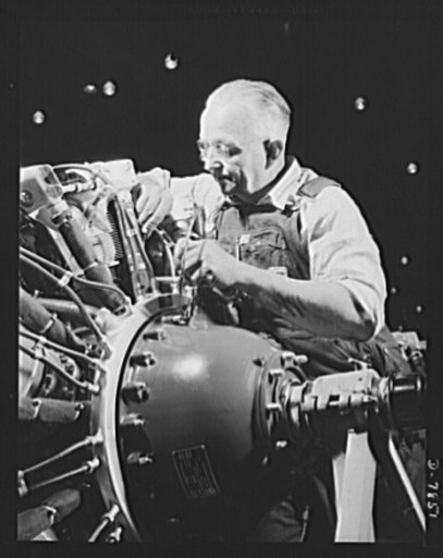 Production. Airplane maufacture, general. A seasoned mechanic at the Long Beach, California, Douglas Aircraft Company, makes final adjustments on an engine for a new airplane. Most important of the many types of aircraft made at this plant are the B-17F ("Flying Fortress") heavy bomber, the A-20 ("H
