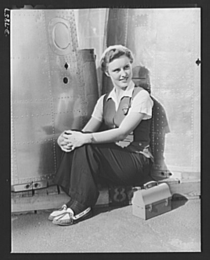 Production. Airplane maufacture, general. A noontime rest for a full- fledged assembly worker at the Long Beach, California, plant of Douglas Aircraft Company. Nacelle parts for a heavy bomber form the background. Most important are the many types of aircraft made at this plant are the B-17F ("Flyin